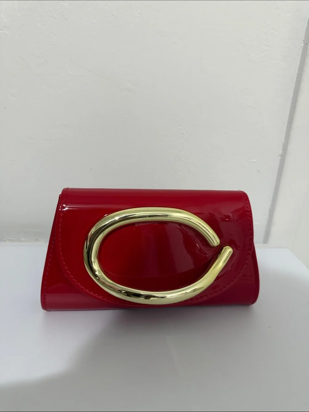 Glossy Red Patent Clutch with Bold Gold Accent